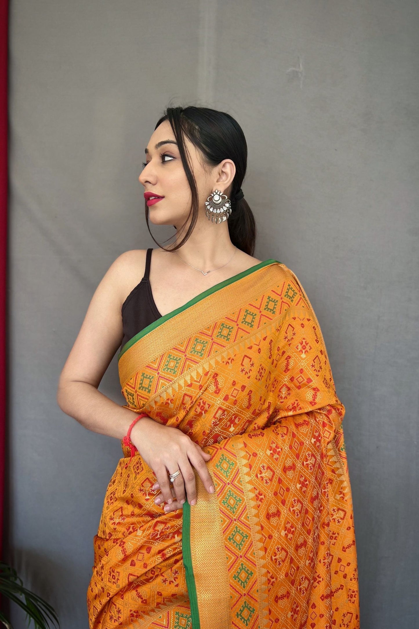 Chrome Yellow Meenakari Zari Weaving Patola Silk Saree