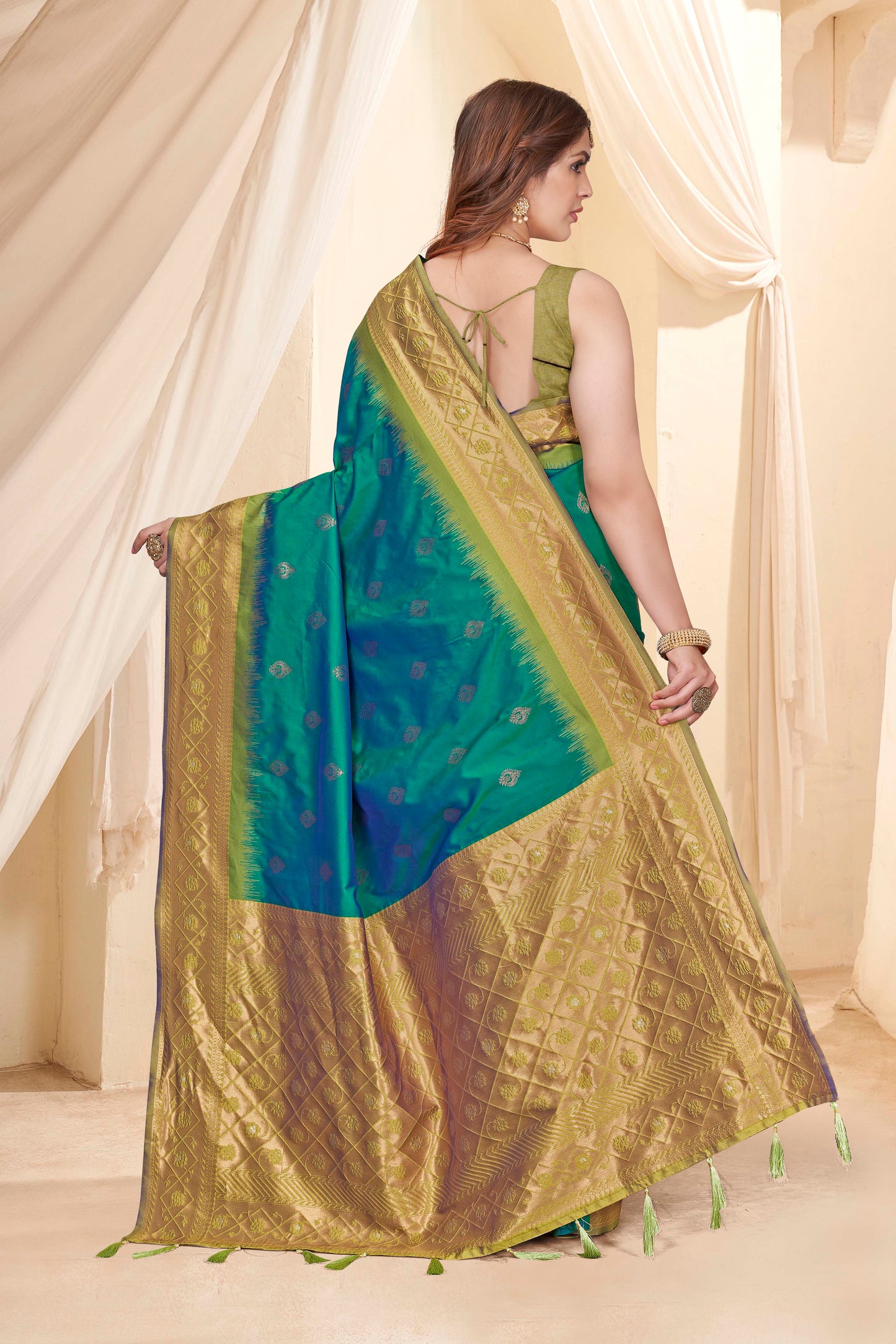 Green Haze Soft Silk Floral Border Contrast Zari Woven Saree