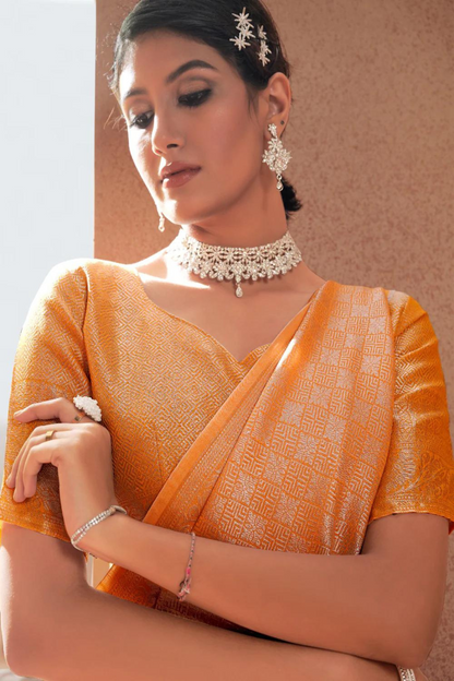 Pastel Orange Silk with Silver Zari Weaving Border